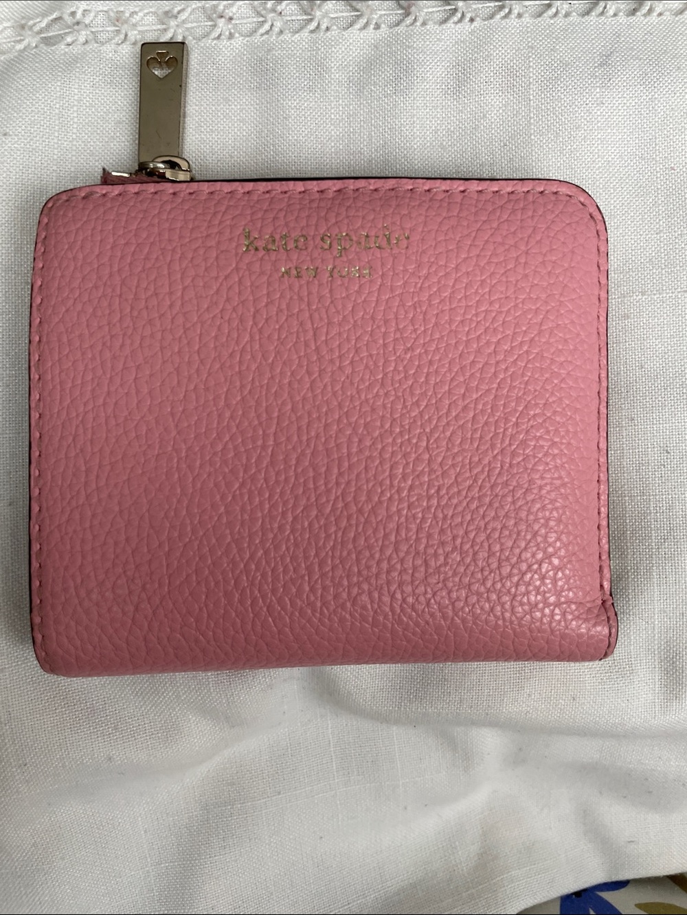 kate spade pink pebbled leather compact zip wallet with gold logo EUC